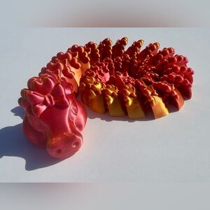 3D-printed "Flexi Diamond Dragon with heart